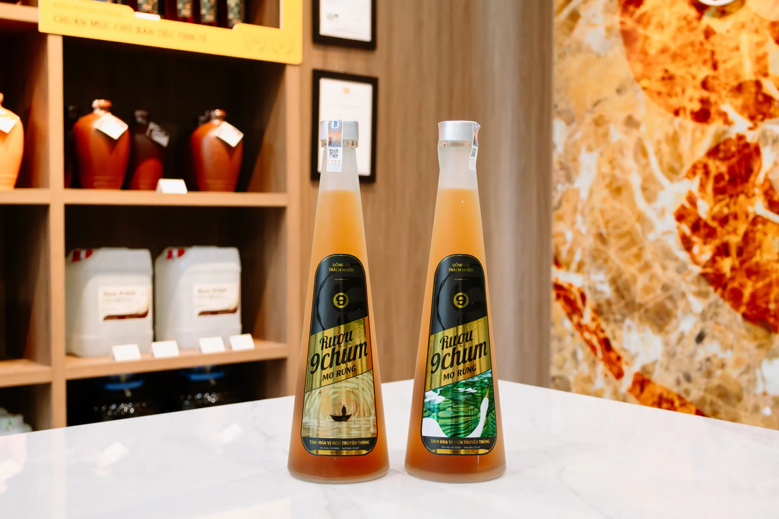 nen-mua-ruou-chai-500ml-hay-binh-1-lit-tu-van